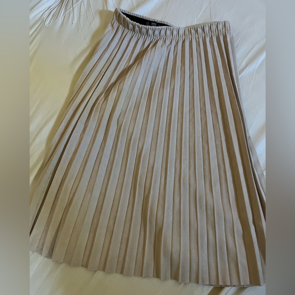 Zara midi length pleated polyester skirt.